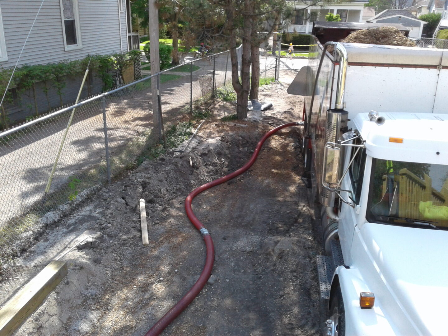 A truck and a long tube connected to it